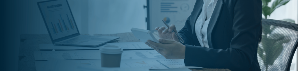 Businesswoman reviewing tax and payroll data – EOR Denmark Special Tax Scheme