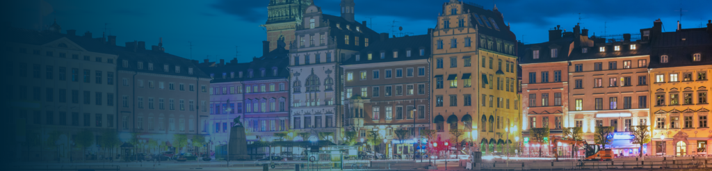 Historic buildings in central Stockholm at night – Sweden expat tax article cover