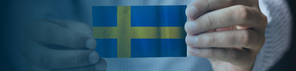Worker showing Swedish ID06 card – required for compliance in Sweden’s construction sector