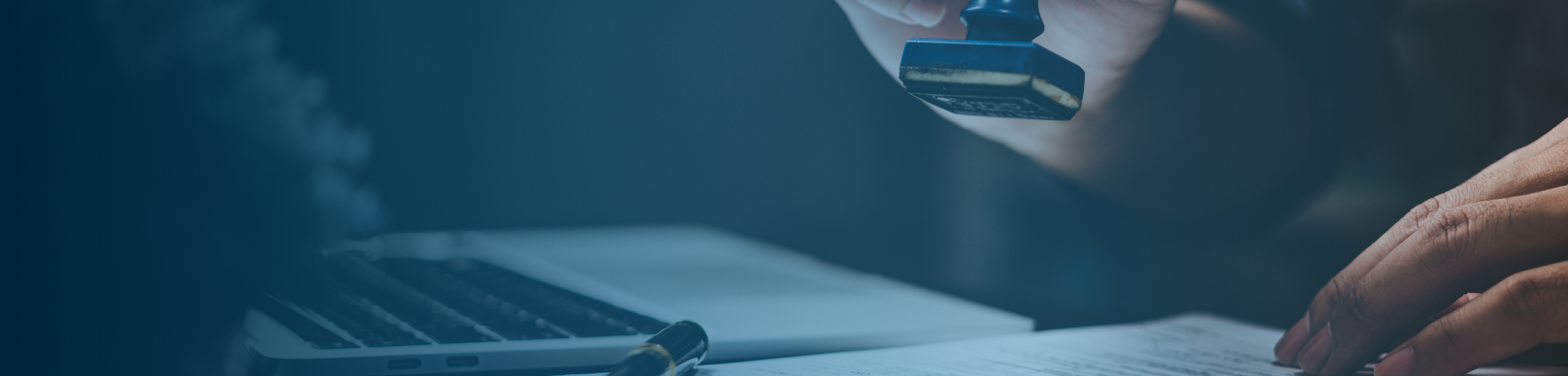 Work permit application documentation being reviewed and approved