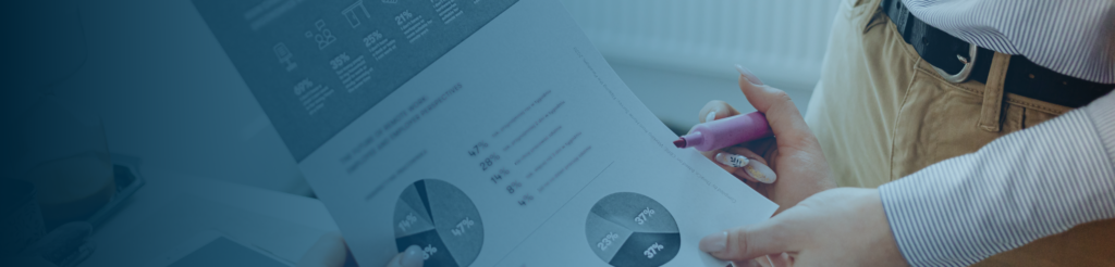 Consultant reviewing financial report with retention rate and net pay analysis in the Nordics