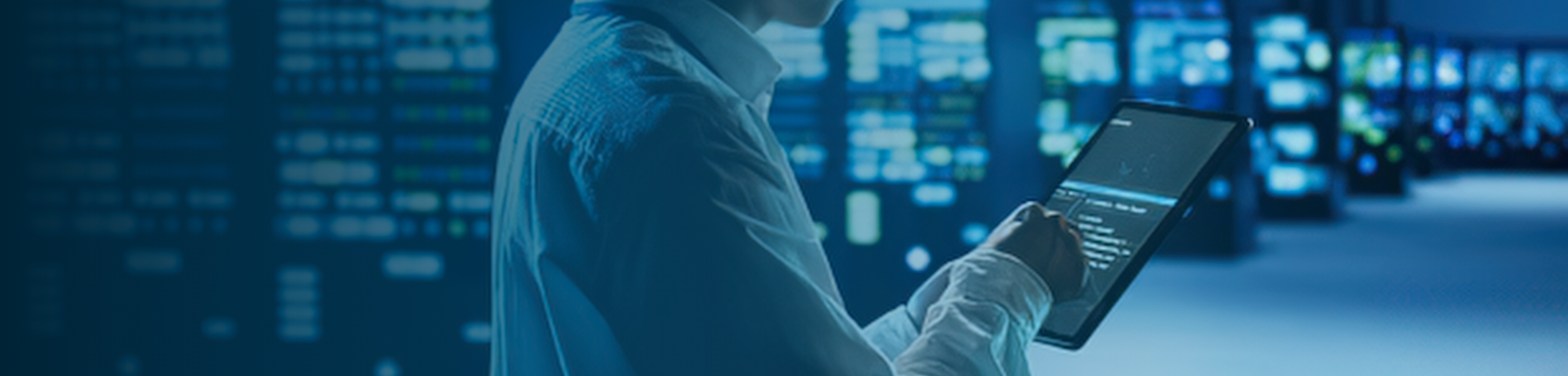 Data center technician reviewing digital infrastructure systems in Finland